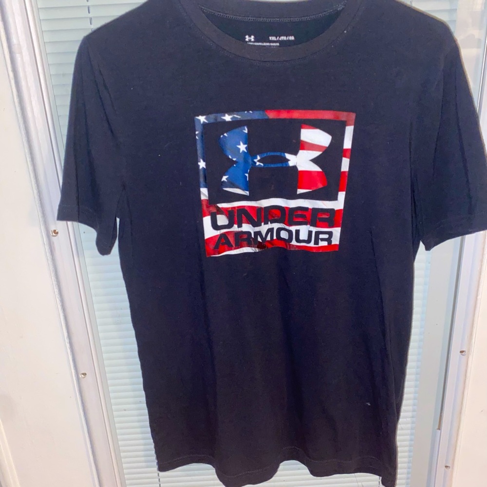 This is a navy blue w under armorred white  blue